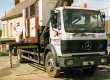 Mercedes flatbed trailer with mounted HIAB crane
