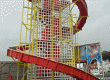 Travelling fairground helter skelter slide